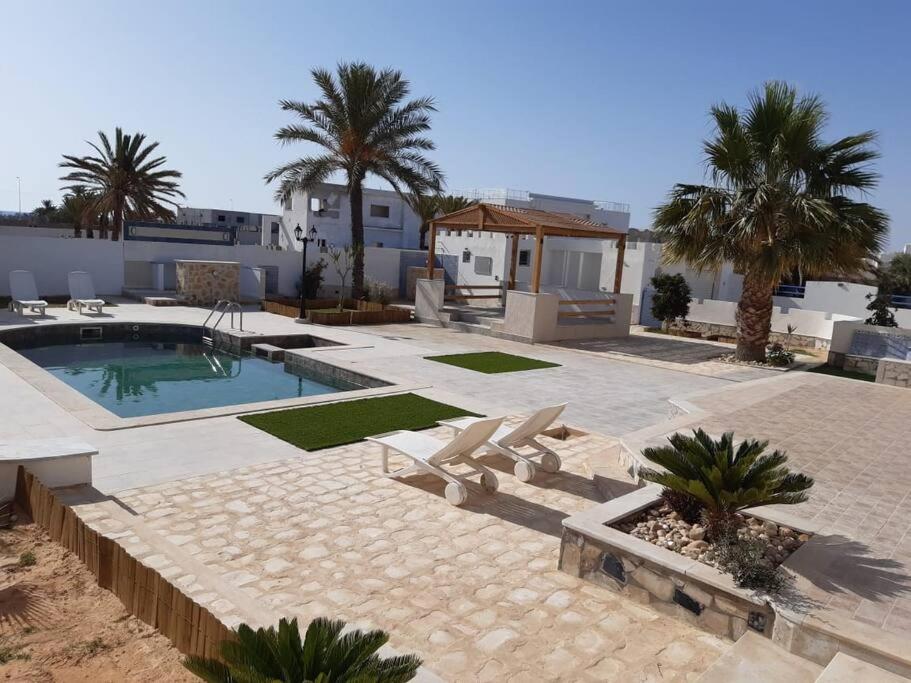 Résidence Mimosas avec piscine et vue de mer, Taguermess