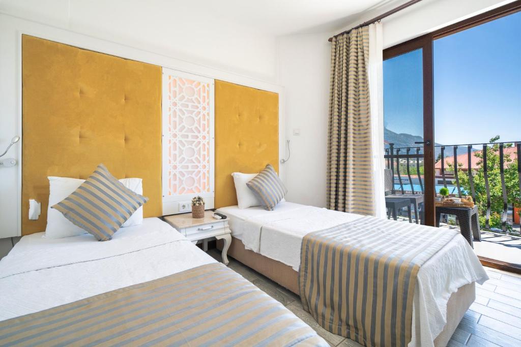 Ata Lagoon Beach Hotel — Hotel rooms in Ölüdeniz, Mugla