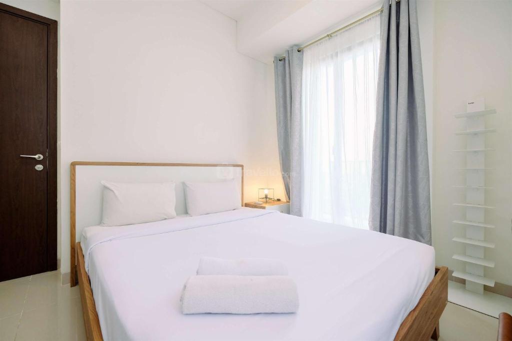 Modern Look and Comfy 2BR at Vasaka Solterra Apartment By Travelio, Jakarta