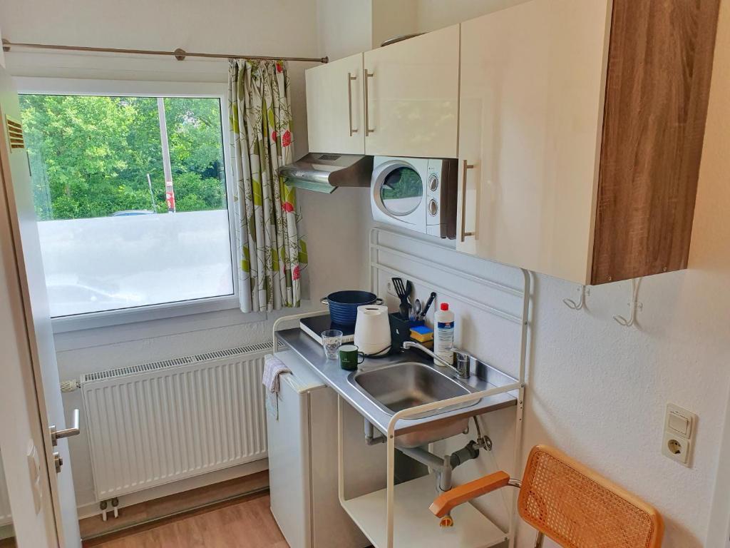 Aparthotel Jonas キッチン