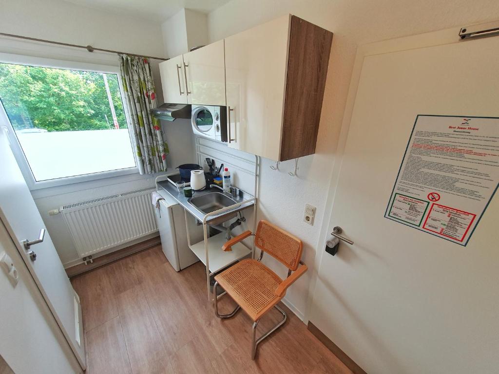 Aparthotel Jonas キッチン