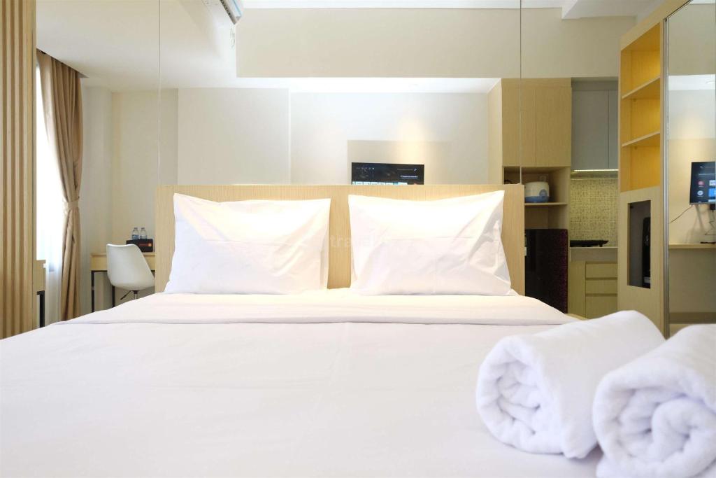 Minimalist Studio at Evenciio Margonda Apartment By Travelio, Depok