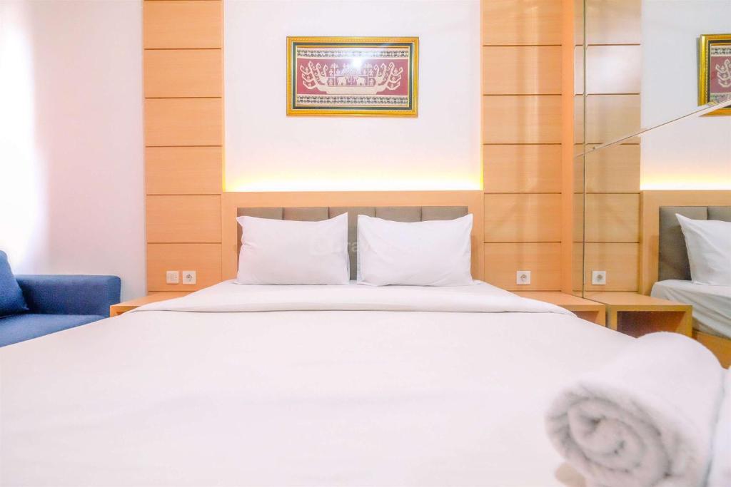 Minimalistic Look Studio Transpark Cibubur Apartment By Travelio, Depok