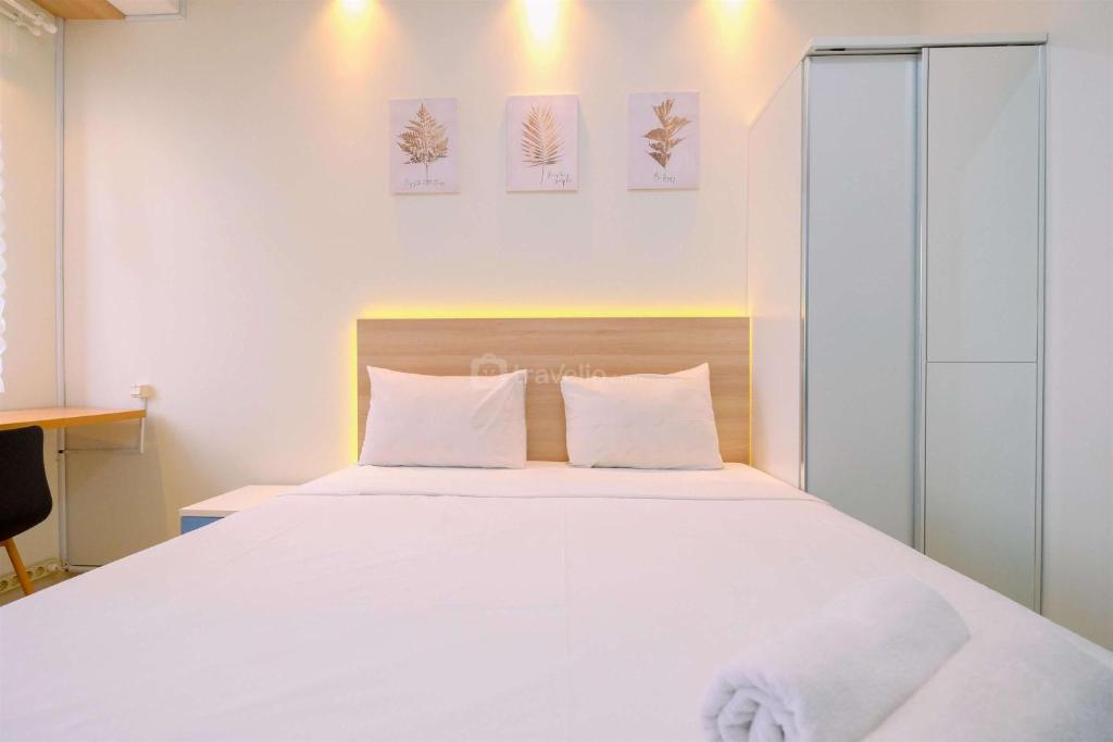 Good and Homey Studio at Transpark Cibubur Apartment By Travelio, Depok