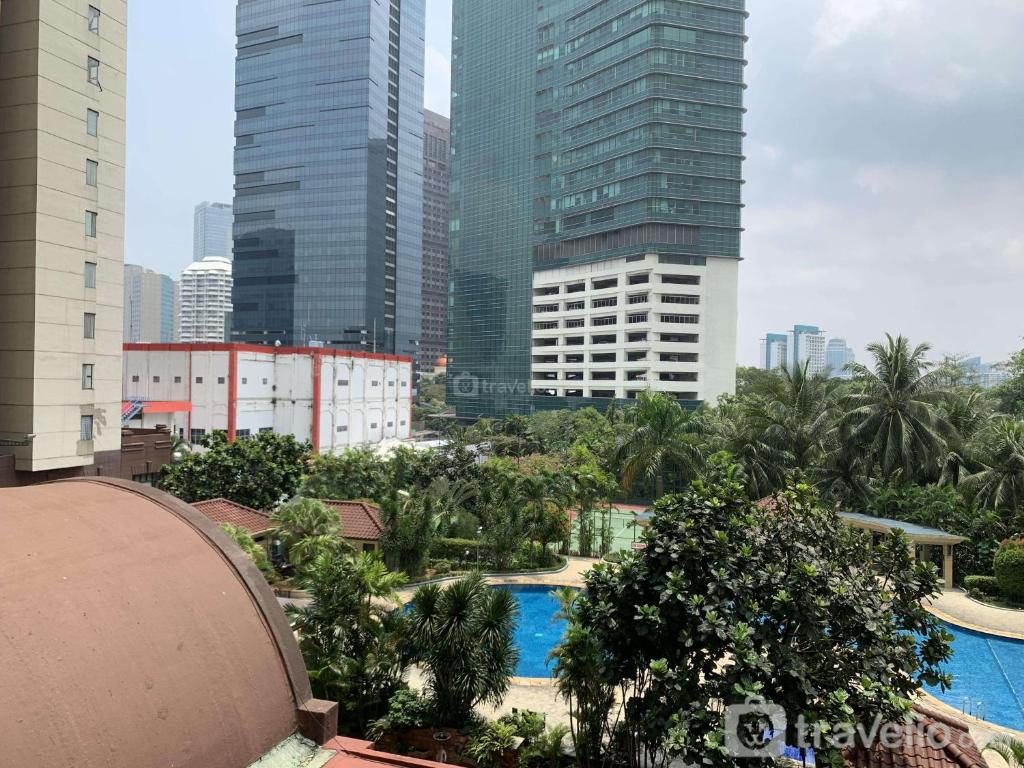 Comfy and Elegant 2BR at Sudirman Tower Condominium Apartment By Travelio, Jakarta