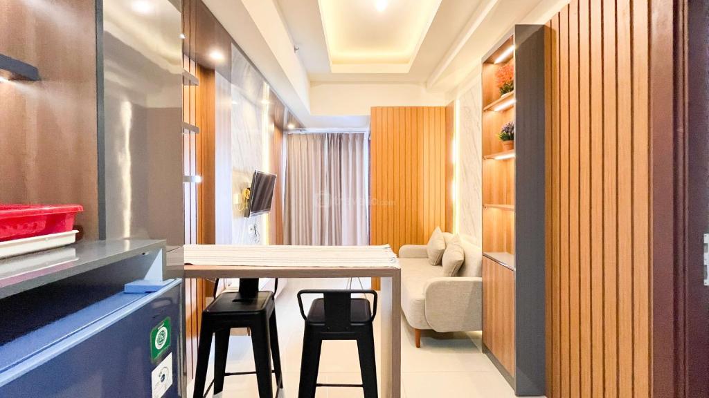 Modern Designed 2BR at Vida View Makassar Apartment By Travelio, Pampang