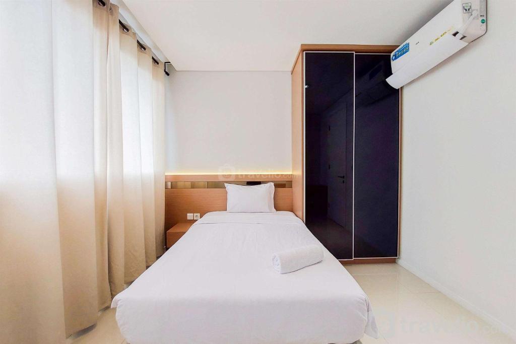 Elegant and Spacious 2BR at Paddington Heights Apartment By Travelio, Tangerang