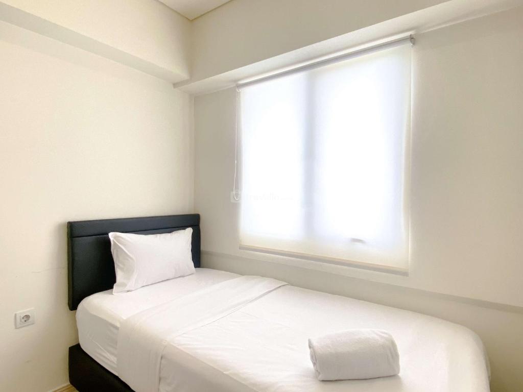 Comfortable and Spacious 3BR Meikarta Apartment By Travelio, Cikarang