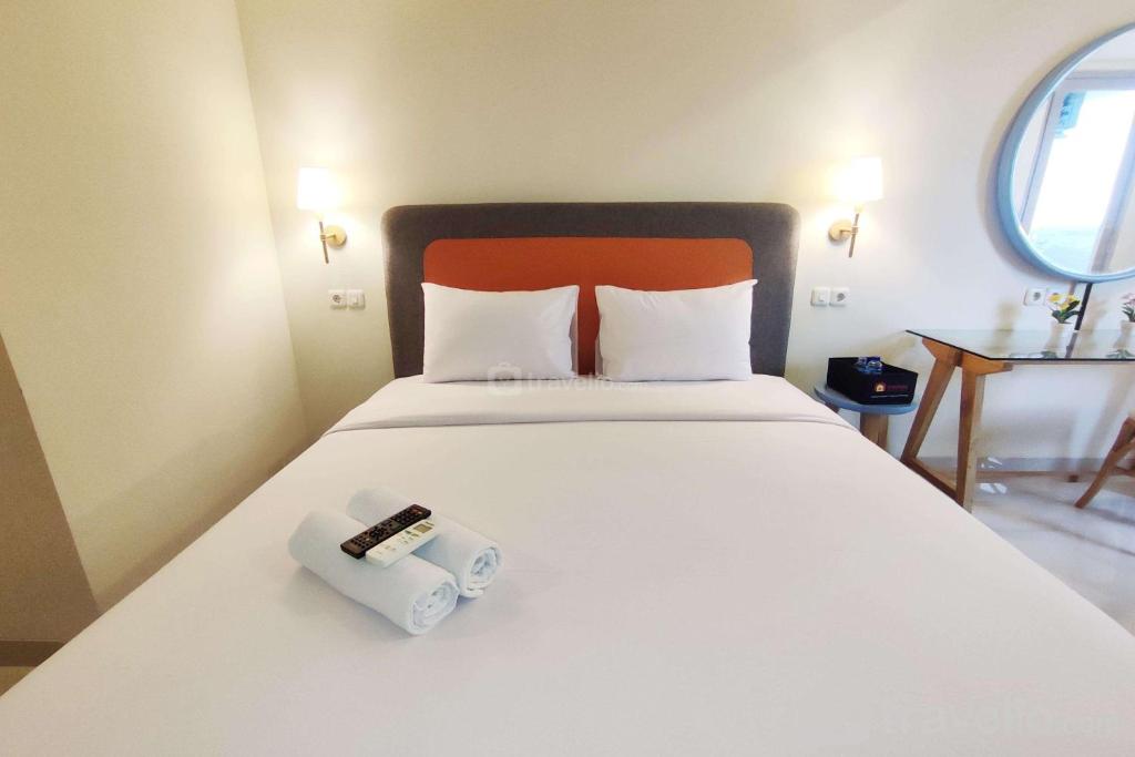 Elegant and Homey Studio at Marquis de Lafayette Apartment By Travelio, Semarang