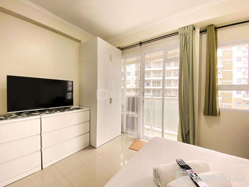 Homey 1BR at Gateway Pasteur Apartment By Travelio