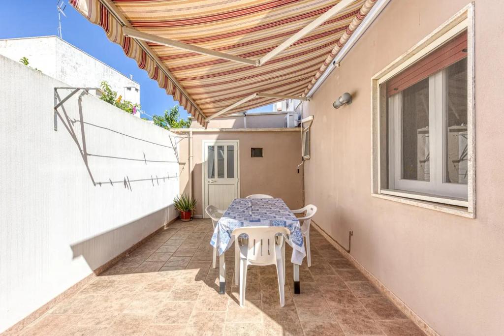Appartamento climatizzato al centro del paese con patio esterno - 1