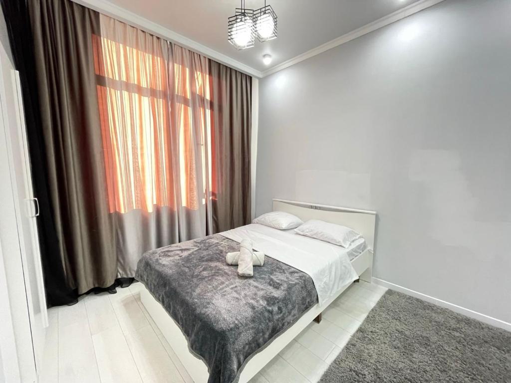 Уютные апартаменты недалеко от Хан шатыр, Taldykolʼ