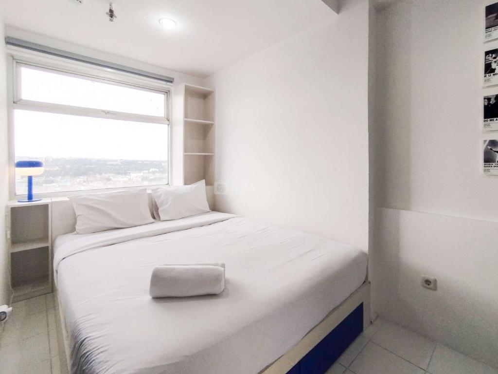 Spaicous 1BR with City View at Grand Asia Afrika Apartment By Travelio, Bandung