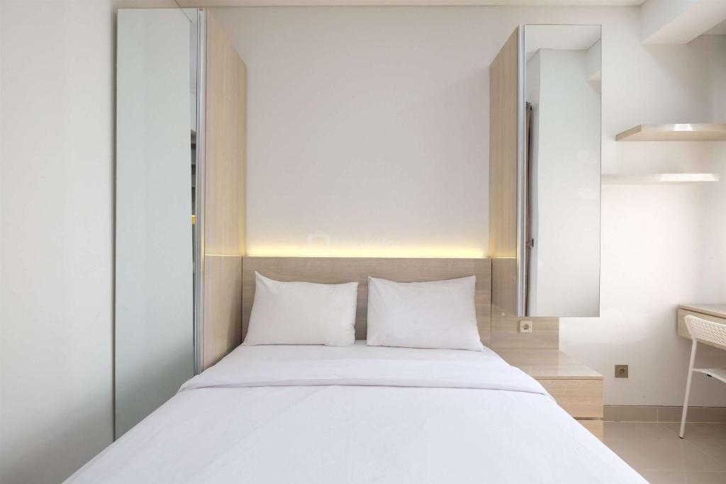 Cozy and Restful Studio at Transpark Cibubur Apartment By Travelio, Depok