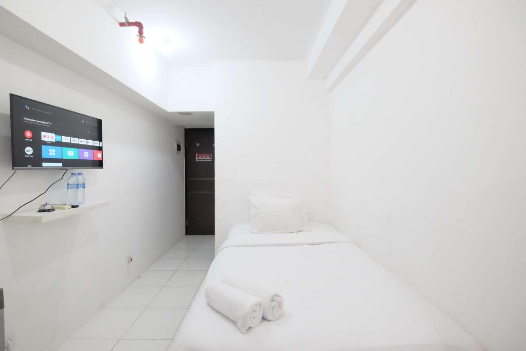 Simply Look Studio at Mont Blanc Bekasi Apartment By Travelio, Bekasi