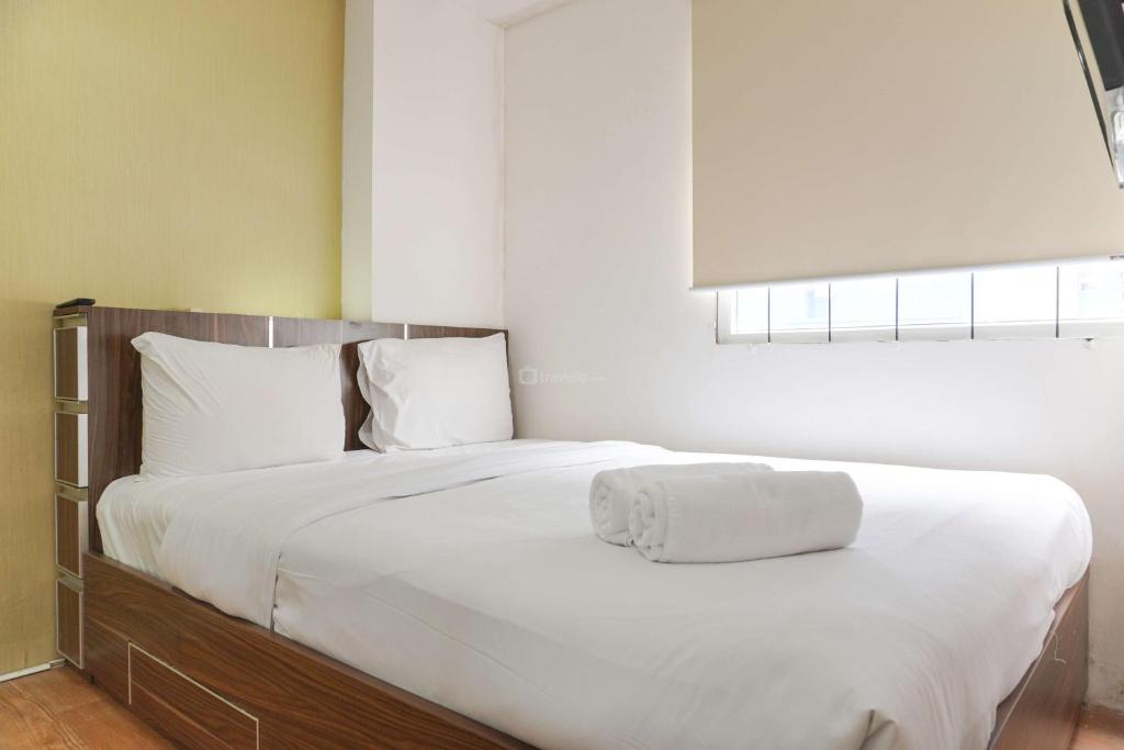 Combined and Spacious 3BR at Green Pramuka City Apartment By Travelio, Jakarta