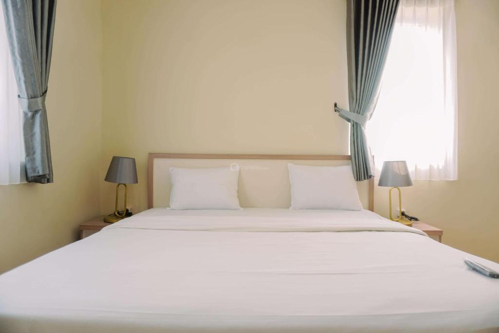 Spacious and Homey 2BR at Grand Palace Kemayoran Apartment By Travelio, Jakarta