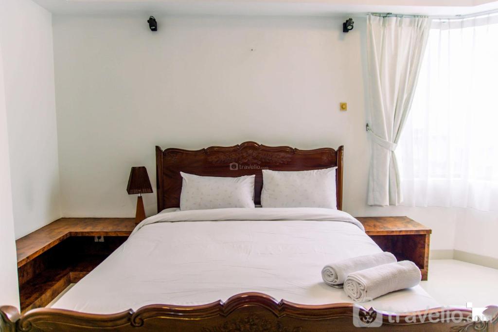 Elegant 2BR with Extra Room Apartment at Sudirman Tower Condominium By Travelio, Jakarta
