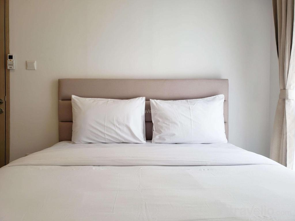 Minimalist and Tidy 2BR Apartment at Tokyo Riverside PIK 2 By Travelio, Rawalembang