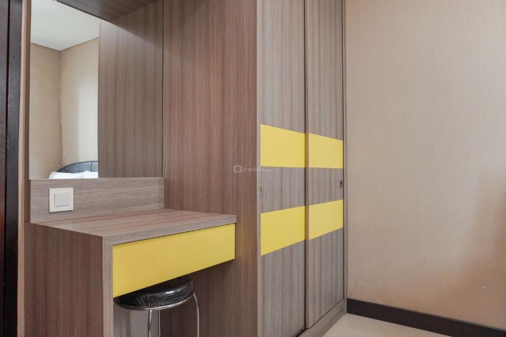 Comfy and Homey 1BR at Sky Terrace Apartment By Travelio, Jakarta