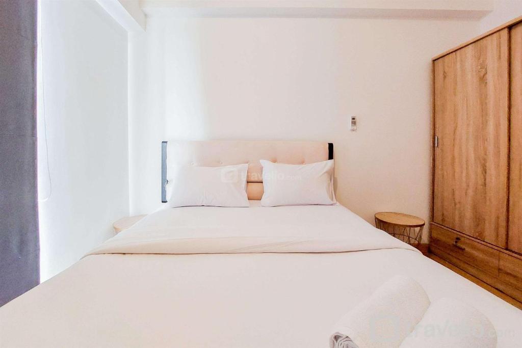 Spacious and Comfortable 2BR at Sky House BSD Apartment By Travelio, Tangerang