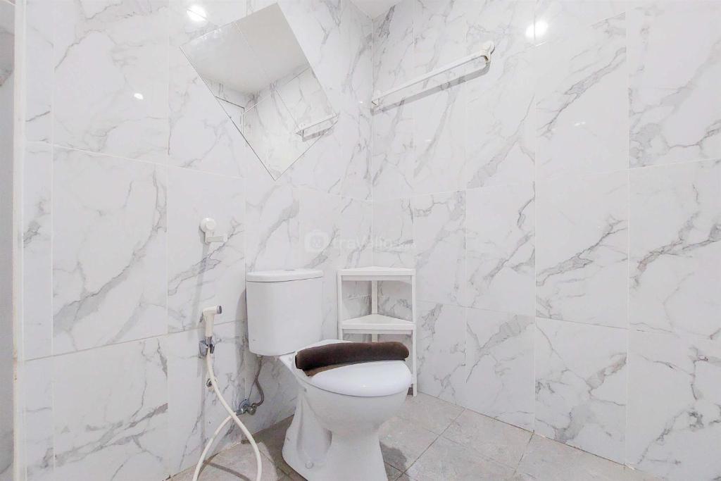 Restful Studio at Anwa Residence Bintaro Apartment By Travelio, Peladen