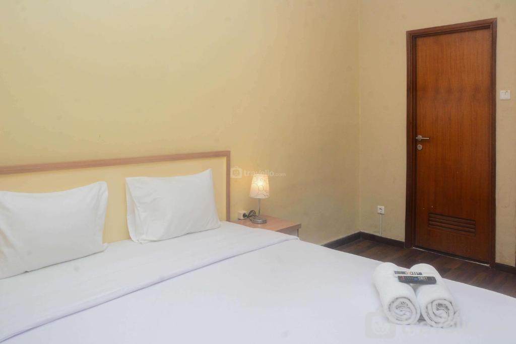 Elegant and Nice 2BR at Grand Palace Kemayoran Apartment By Travelio, Jakarta