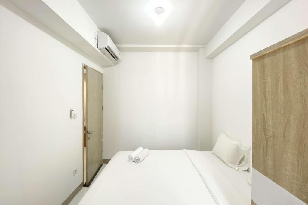 Comfortable 2BR at Tokyo Riverside PIK 2 Apartment By Travelio, Rawalembang