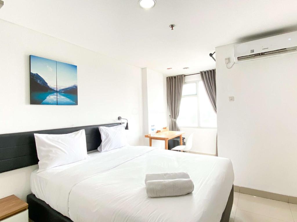 Minimalist Studio at Enviro Apartment By Travelio, Cikarang
