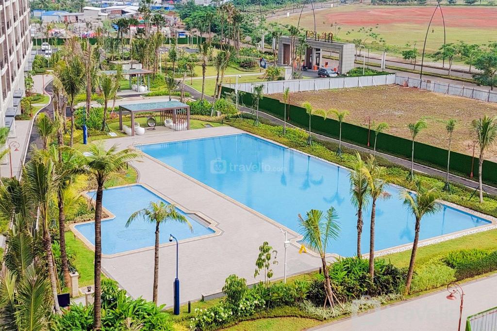 Scenic and Restful 2BR Sky House BSD Apartment By Travelio, Tangerang