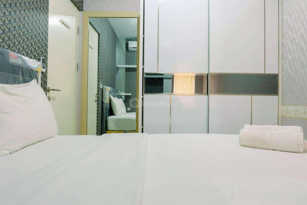 Enjoyable 2BR at Springlake Summarecon Bekasi Apartment By Travelio, Bekasi