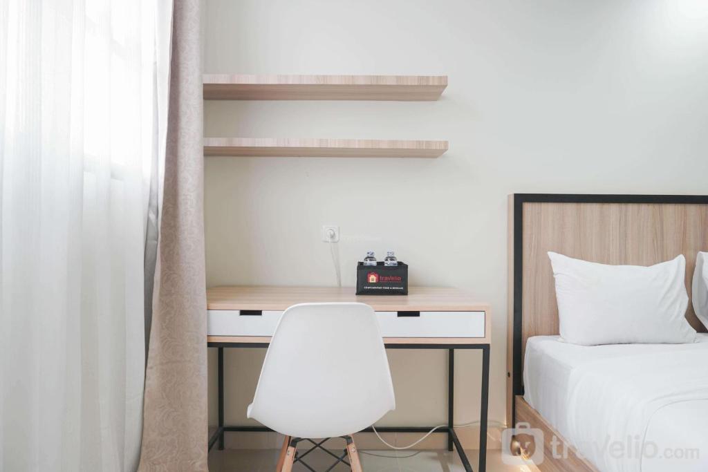 Nice and Cozy Studio at Evenciio Margonda Apartment By Travelio, Depok