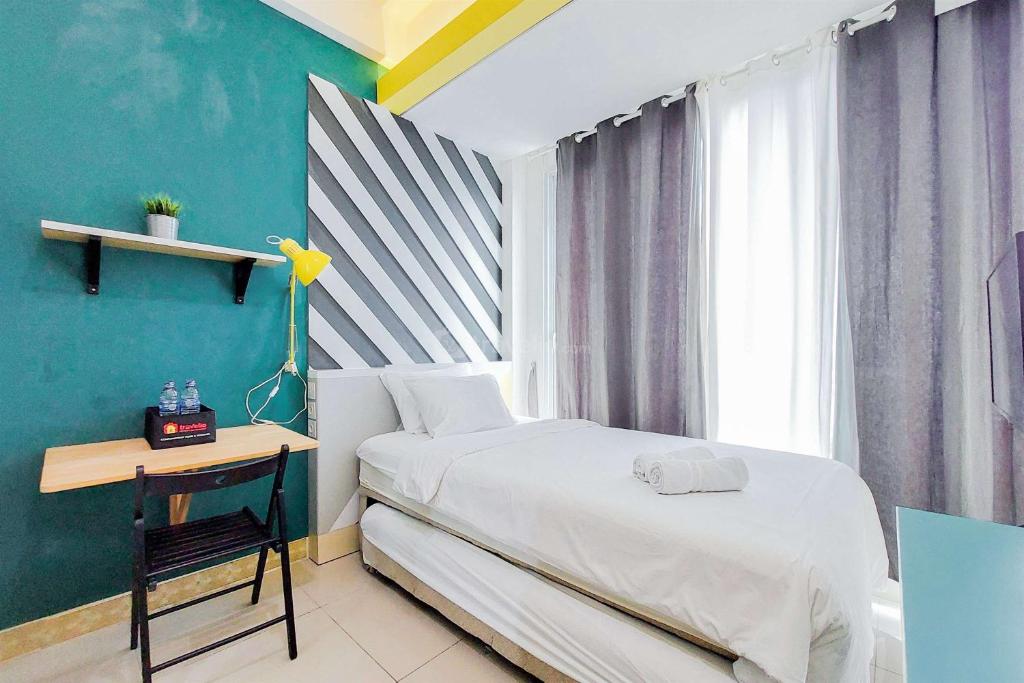 Minimalist Studio at Tree Park City BSD Apartment By Travelio, Tangerang