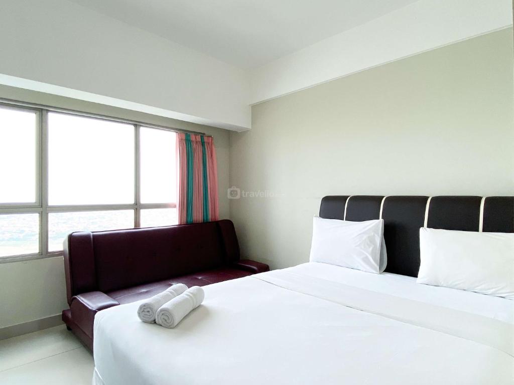 Simply Look Studio at Springlake Summarecon Bekasi Apartment By Travelio, Bekasi