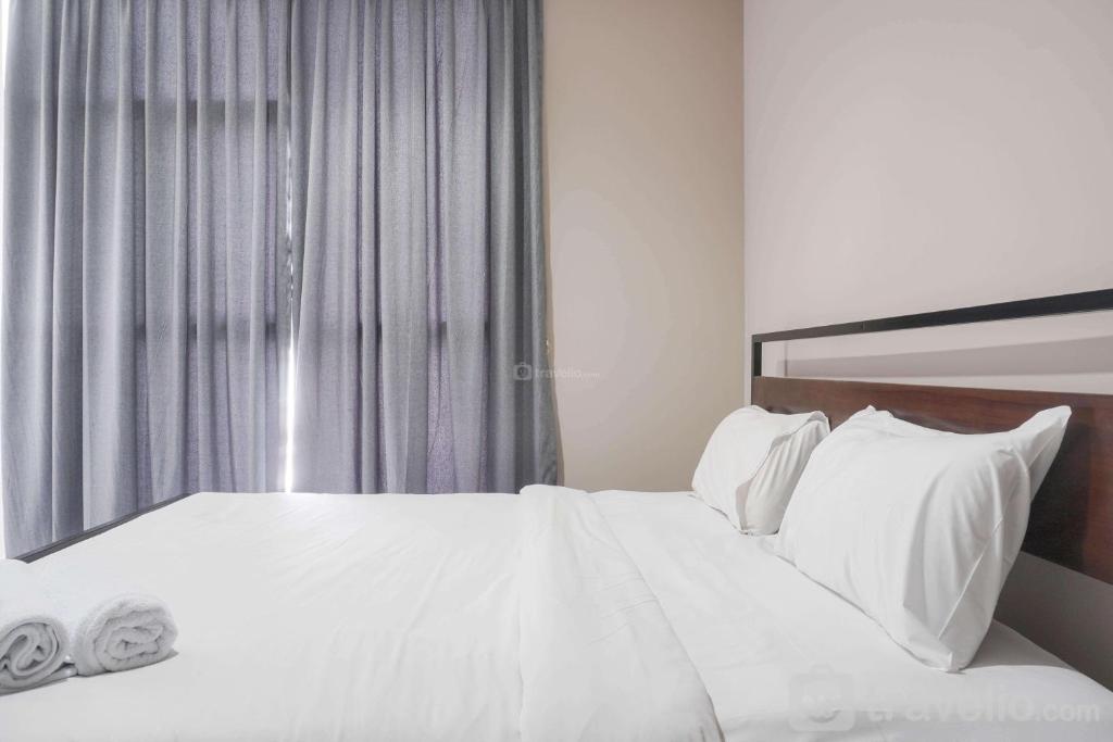 Nice and Fancy 1BR at Ciputra International Apartment By Travelio, Jakarta