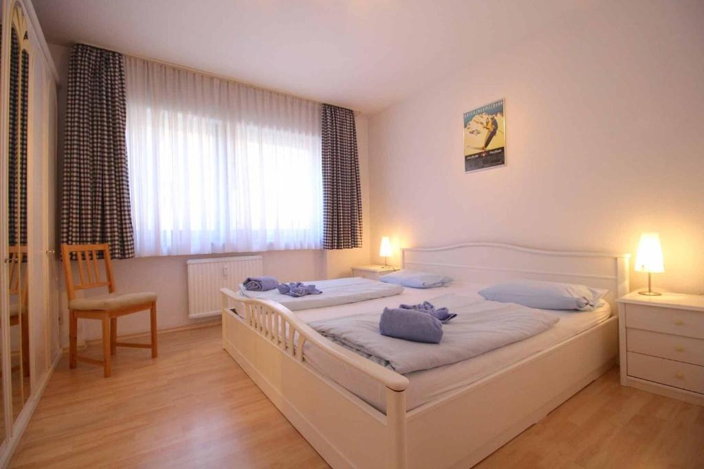 Wohnung in Garmisch Partenkirchen mit Garten, Garmisch-Partenkirchen