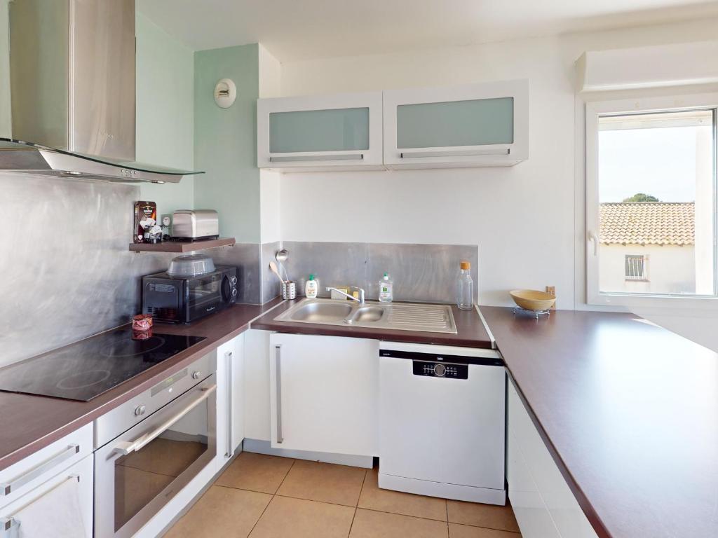 Frontignan : Appartement 2 pièces avec terrasse, parking, proche plage et commerces - FR-1-785-5 - 4