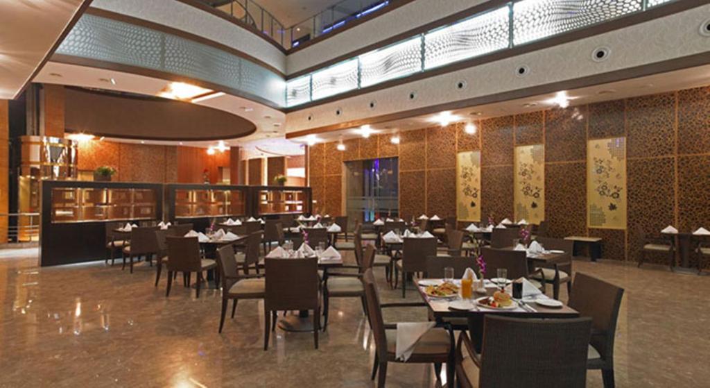 Restaurant, Royal Orchid Central Kireeti Hampi in Hosapete