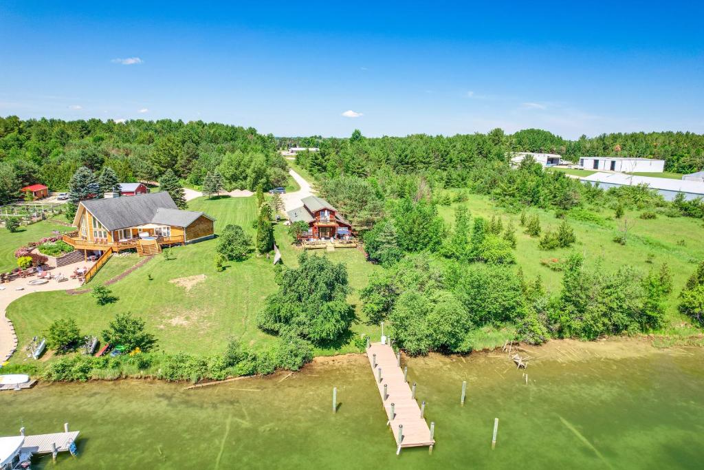 Riverfront Cheboygan Home with Dock about 4 Mi to Town!, Cheboygan