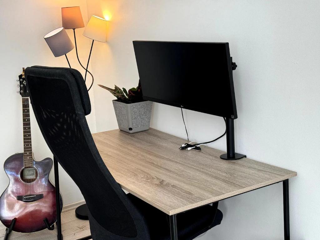 Workspace with Monitor City Center Parking, AC - 3