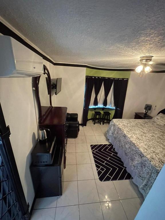 Hide Away From Home, May Pen