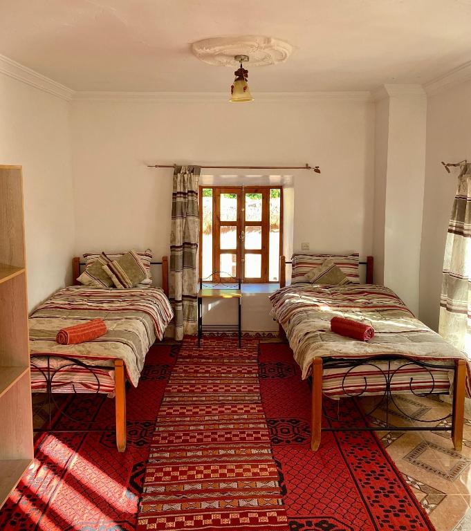 Chambre Quadruple avec Salle de Bains Commune