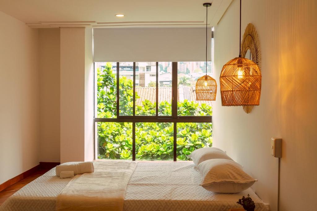 Elegante habitación baño compartido en Poblado-B11, Медельин