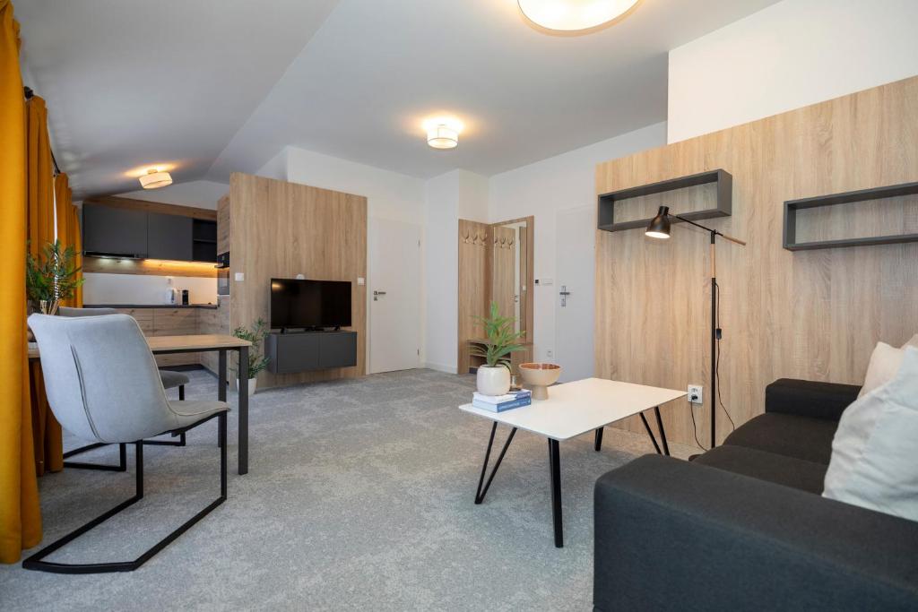 ALURE RESIDENCES 11 - 24h self check-in & private parking next to the apartment building included, CITY CENTER right on SNP Square in a quiet passage, new building, best deal in town, Banská Bystrica