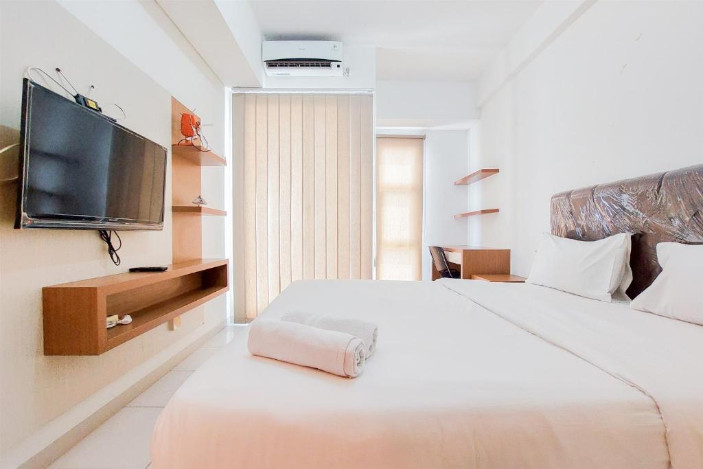 Restful Studio Room at Akasa Pure Living BSD Apartment By Travelio, Tangerang