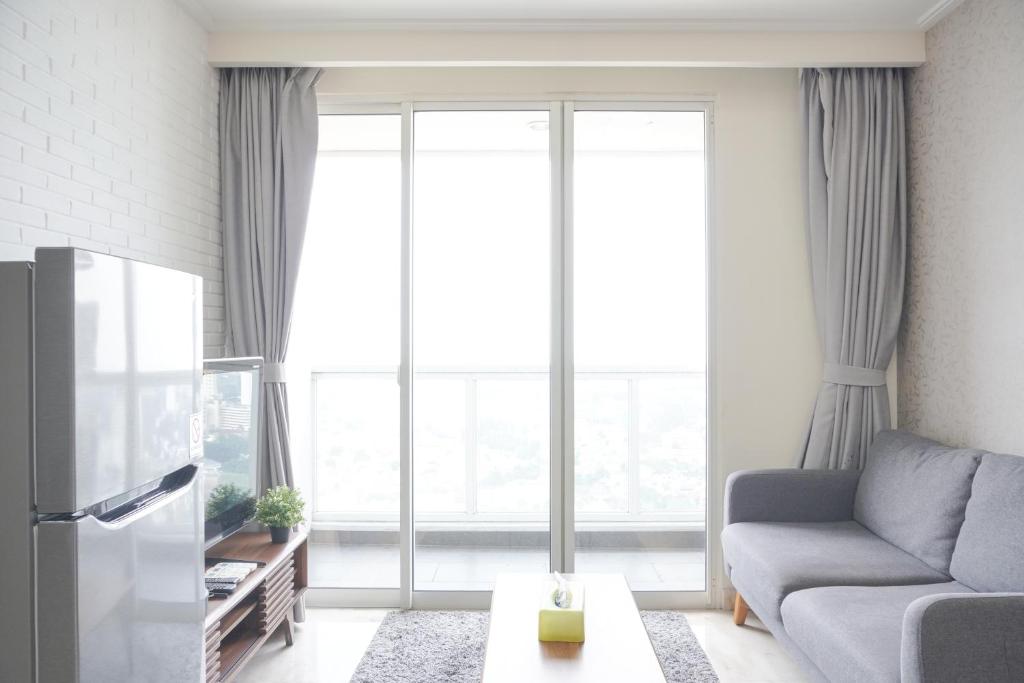 Modern and Elegant 2BR at Menteng Park Apartment By Travelio, Jakarta
