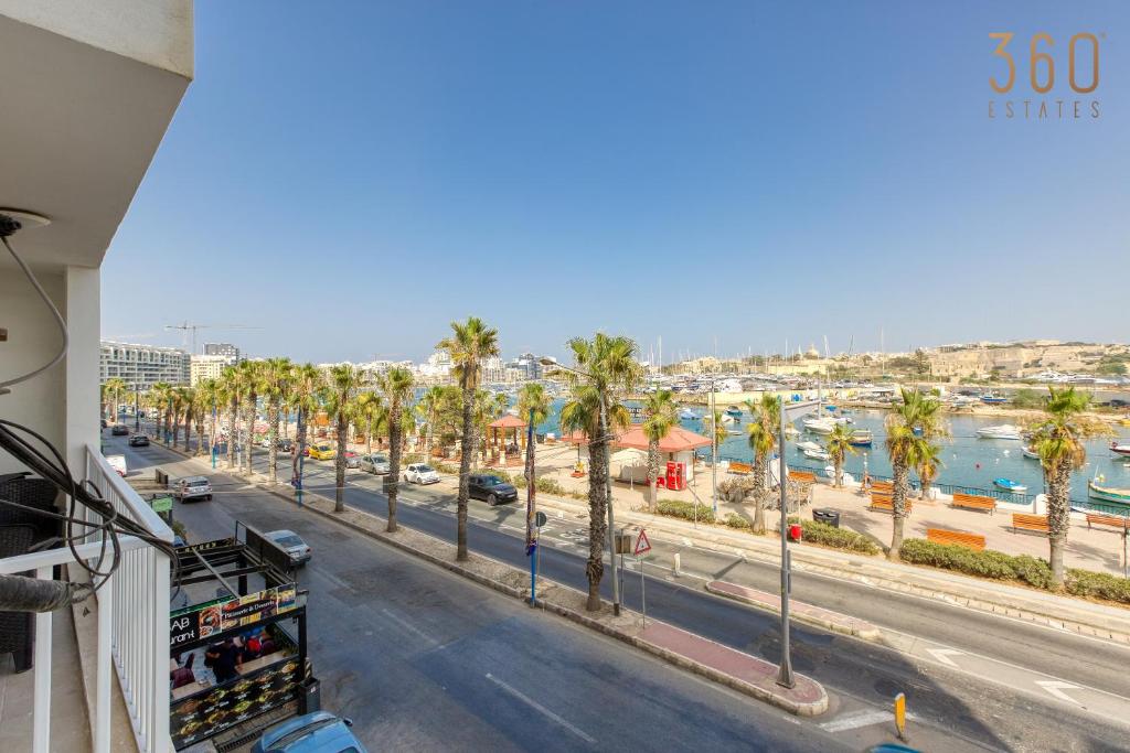 A beautiful 2BR seafront home with private terrace by 360 Estates, Gżira
