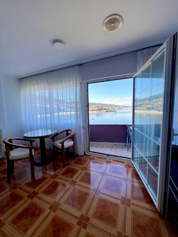 Hotel Playa de Quenxe