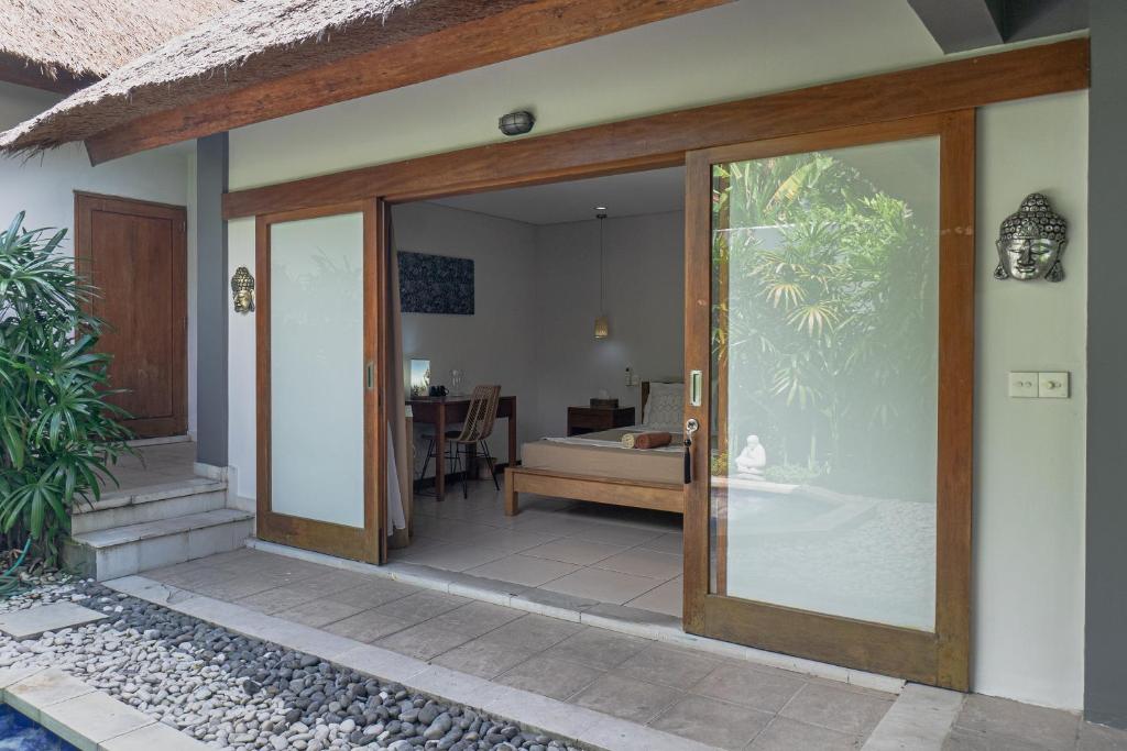 Relaxing by the pool at a Balinese holiday home
