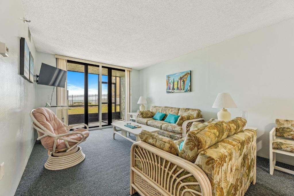 Ocean View with a beachfront pool at Ocean Trillium Condo ~ 103, New Smyrna Beach